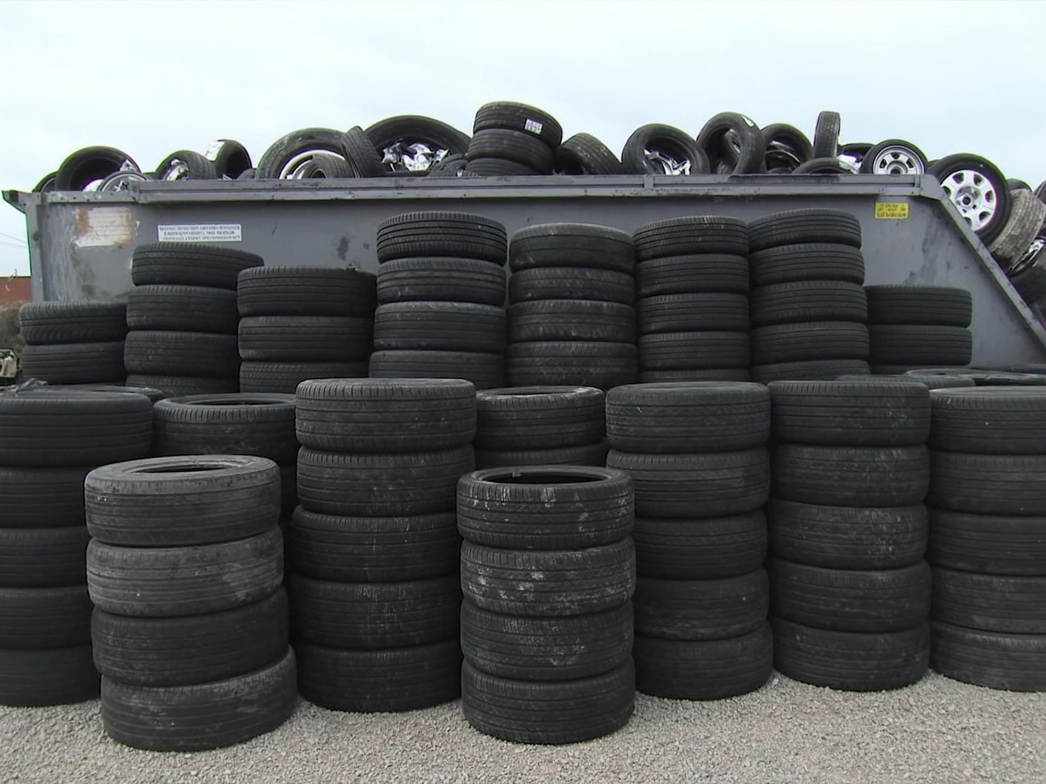 Used car and truck tires stacked for recycling